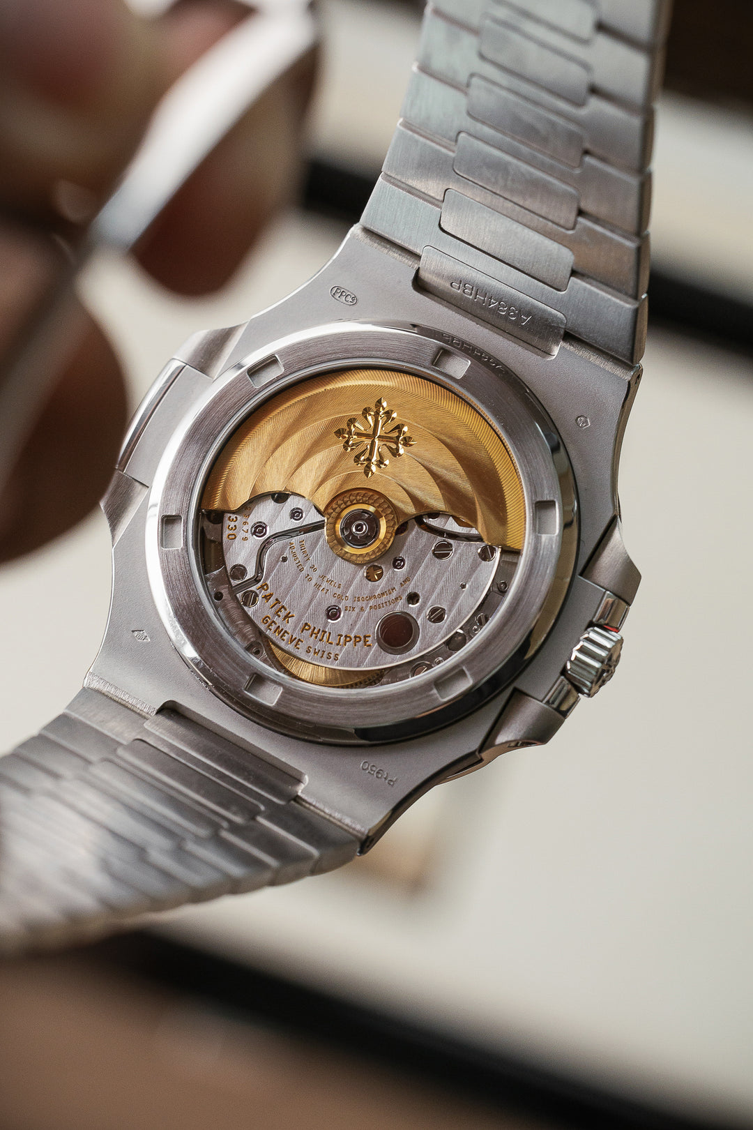 Patek Philippe 5711/112P-001 Platinum Nautilus Grey Dial Ruby Bezel