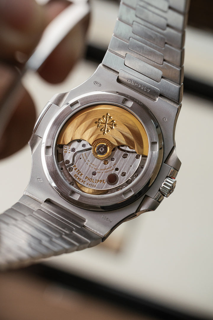 Patek Philippe 5711/112P-001 Platinum Nautilus Grey Dial Ruby Bezel