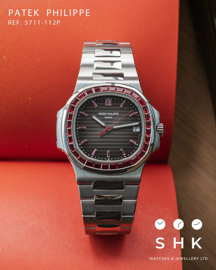 Patek Philippe Nautilus 5711/112P-001 Platinum Grey Dial Ruby Bezel