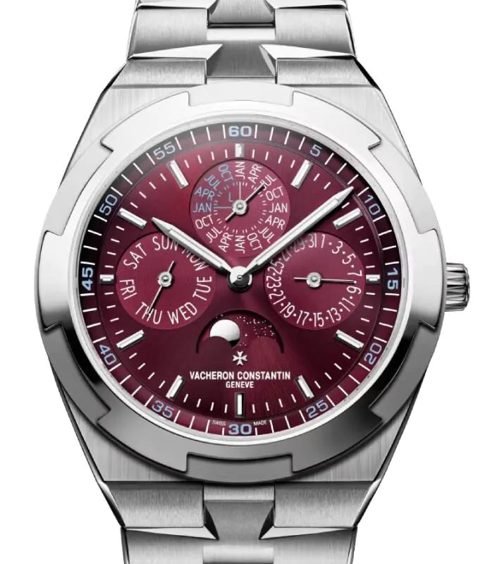 Silver watch with a burgundy face on a white background